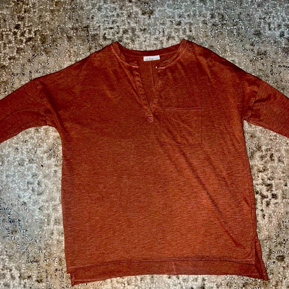 In loom brand. Burnt orange, long sleeve, v neck top. New without tags.